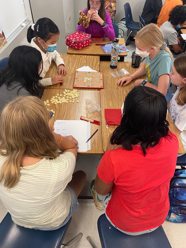 Students enjoying Scrabble during recess.