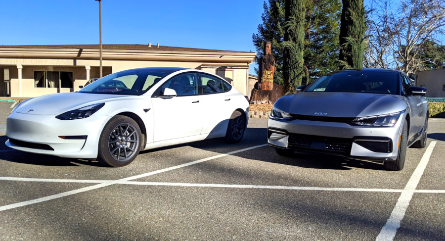 Tesla model 3 next to a KIA EV6.