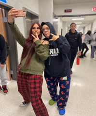 Some “new students” taking selfies during Flipped Friday.